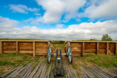 A Revoluationay War Era Cannon Looking Out From General Muhlenberg's Brigade Redoubt in Valley Forge National Historical Park clipart