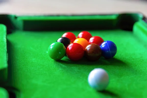 a small pool table in selective focus