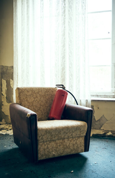 Fire extinguishers in armchair