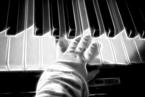Touches de piano avec mains de bébé — Photo