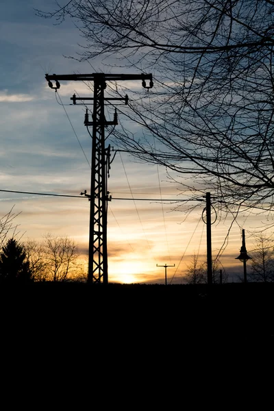 Elektrik direğinden günbatımı — Stok fotoğraf