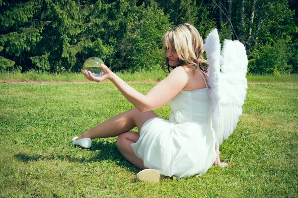 Angel with glass ball II — Stock Photo, Image
