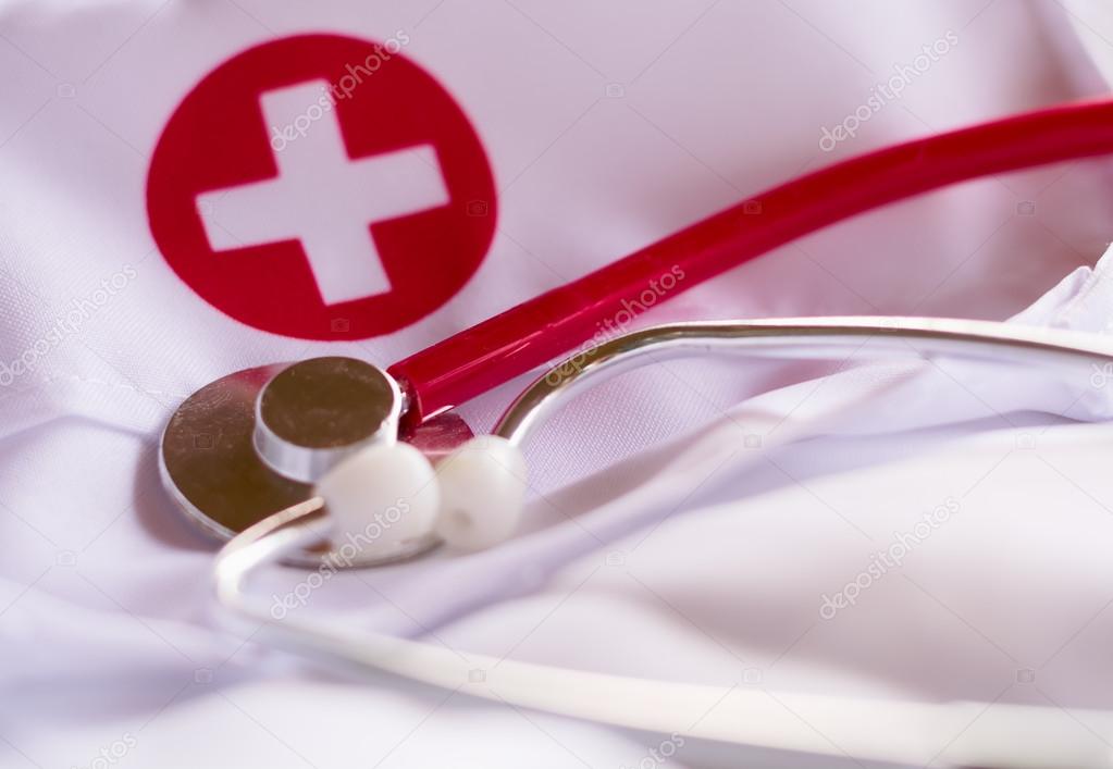 red stethoscope on a lab coat