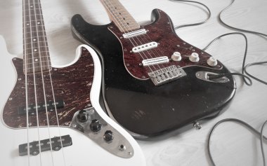 Vintage dirty worn electric guitar and bass clipart