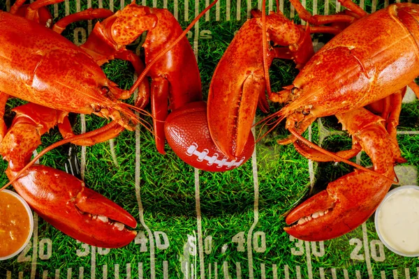 Two Red Cooked Lobsters Green Plate Football Ball American Football — Stock Photo, Image