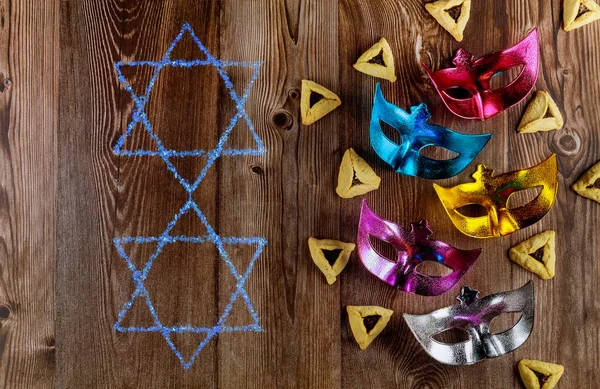 Holiday Purim 배경에 마스크와 Hamantaschen — 스톡 사진