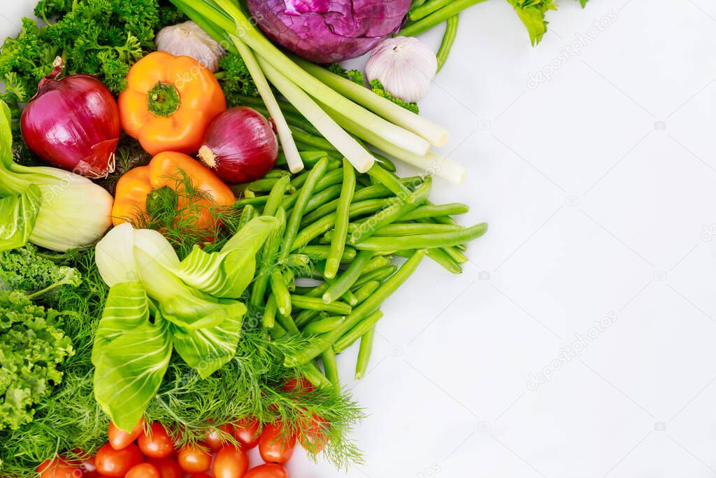 Colorful fresh vegetable on white background. Top view.