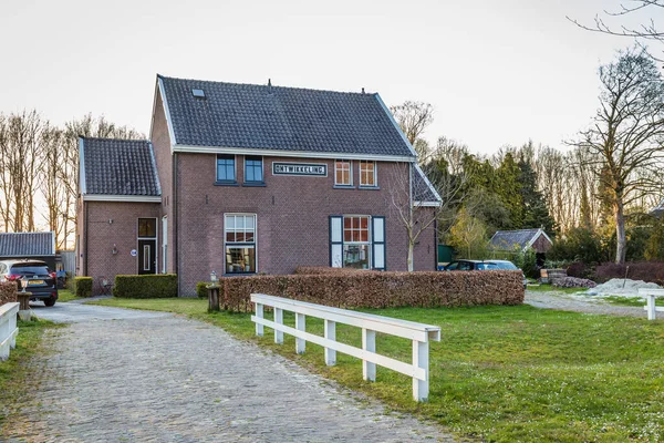 Casa chamada Ontwikkeling Desenvolvimento em Veenhuizen nos Países Baixos — Fotografia de Stock