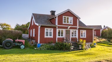 Red cottage on the island Harstena in Sweden, principally known clipart