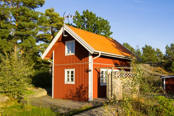Red cottages on the island Harstena in Sweden, principally known