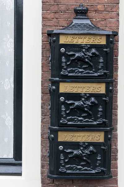 Three green old letterboxes — Stock Photo, Image