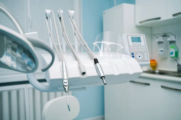 Dental equipment in the doctors office, mask, light, dental treatment clinic
