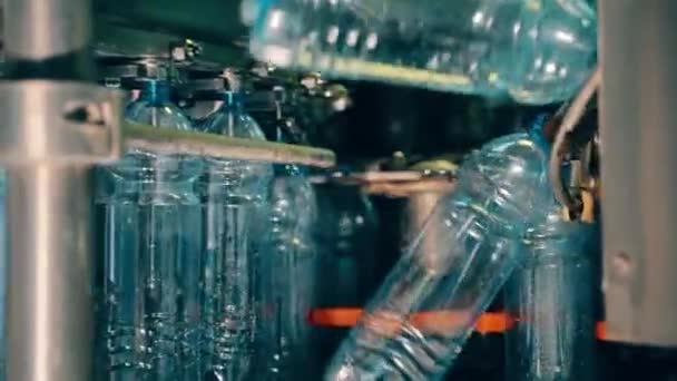 Beverage factory interior. Conveyor with plastic bottles — Stock Video