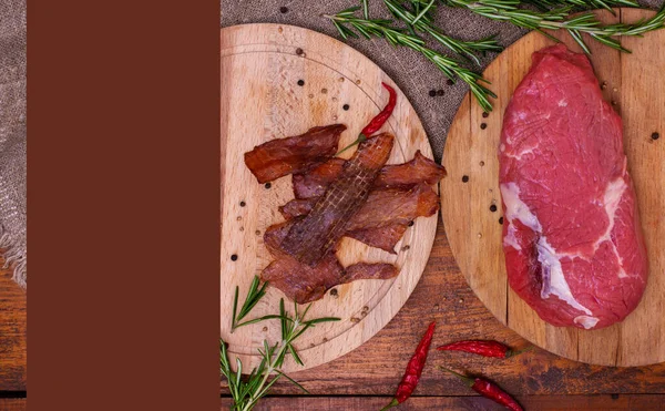 Jerky Meat Raw Beef Circle Wooden Boards Brown Background Copy Royalty Free Stock Photos