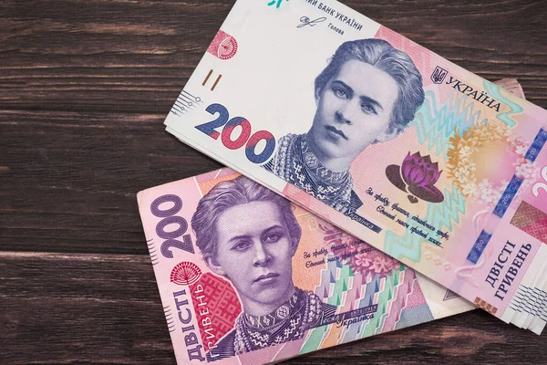 Oekraïens Geld Een Houten Achtergrond Nieuwe Oude Bankbiljetten Van 200 — Stockfoto