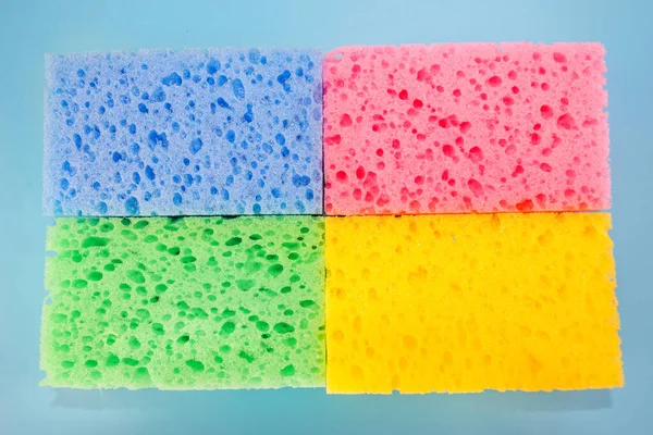 Stacked Together Colored Washcloths Blue Background Close — Stockfoto