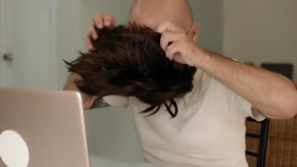 Bald Man Playfully Puts Wig Talks Videocall Fullhd Footage — Stock Video