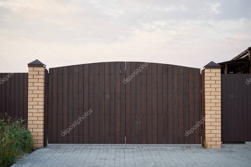Minimalistic brown wooden gate