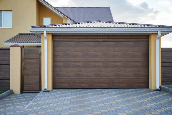 Plastic garage door and plastic entrance door