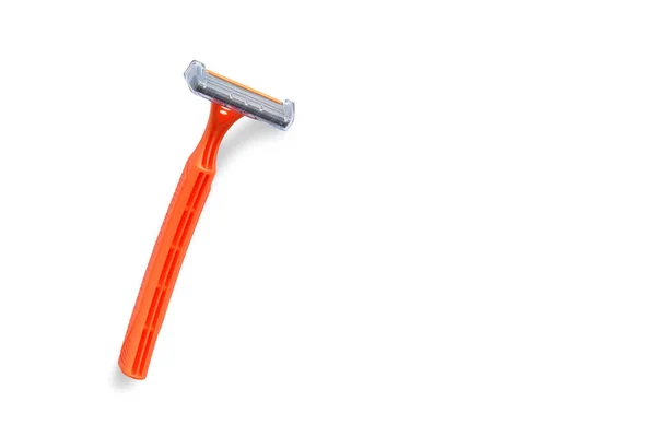 Navaja de afeitar desechable naranja — Foto de Stock