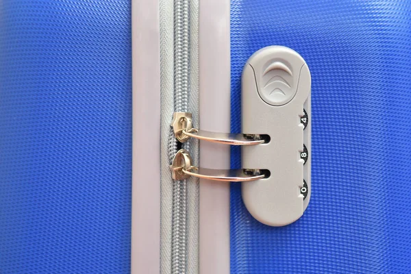 Combination lock close up on blue travel suitcase — Stock Photo, Image