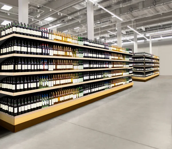 Wine bottles on shelf. Red and White vine bottles on shelves in supermarket interior. 3D rendering Suitable for presenting new Vine bottles and new brand label among many others.