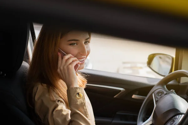 Side Portrait Happy Young Woman Sitting Driver Seat Talking Mobile — Stockfoto