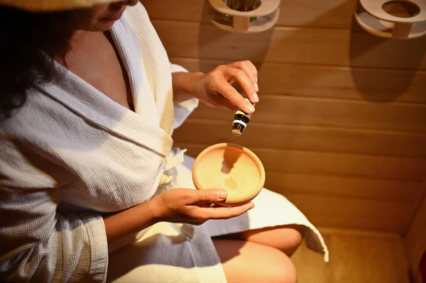 Top View Woman Bathrobe Steamed Sauna Pouring Some Drops Essential — Stock Photo, Image