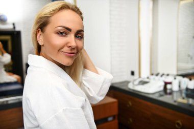 Close-up portrait of the face of a beautiful smiling Europeen woman in spa clinic.