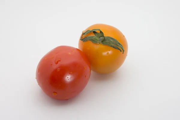 Жовті та червоні помідори — стокове фото