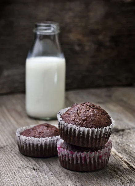 Muffins and a bottle of milk — Stock Photo, Image