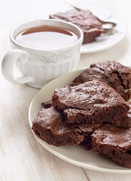 Chocolate brownie and  cup of tea — Stock fotografie