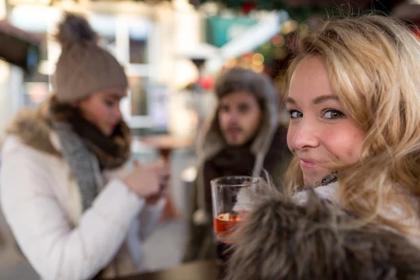 Couple, man, woman, friends have fun at the Christmas Market — Stock Photo, Image