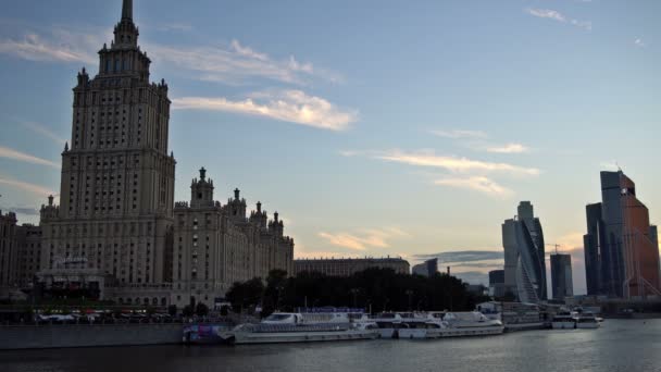 The Hotel Ukraina, the skyscrapers of the Moscow International Business Center (Moscow-City) and the Moskva River at the sunset. UHD - 4K. September 02, 2016. Moscow. Russia — Stock Video