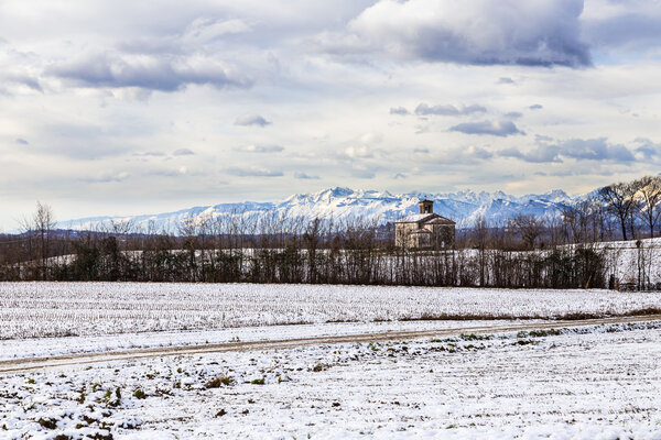 snow on an ancient church of italy