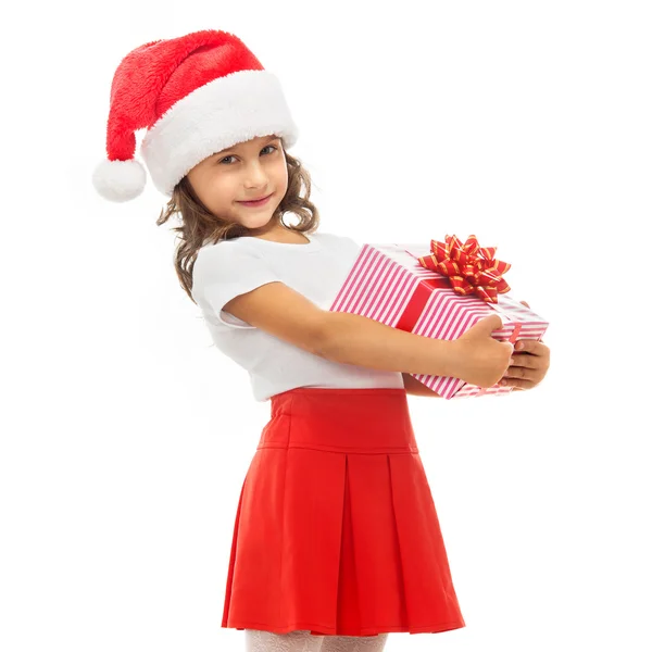 Παιδί κρατώντας το πλαίσιο δώρο Χριστουγέννων στο χέρι. Απομονωμένος σε φόντο — Φωτογραφία Αρχείου