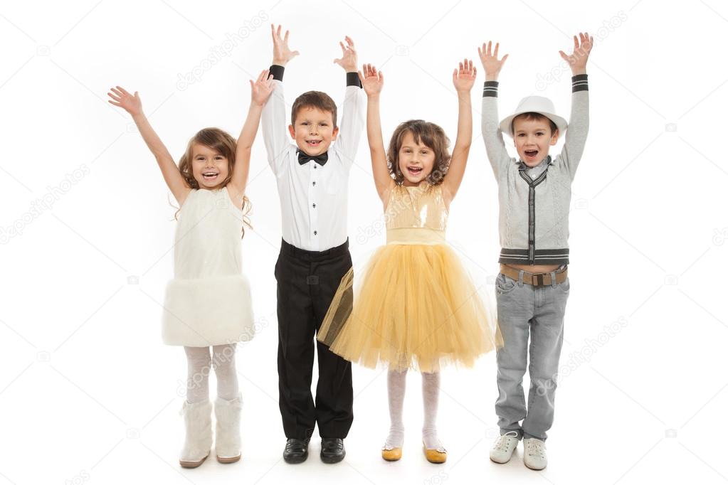 Group of happy kids in celebratory clothes.