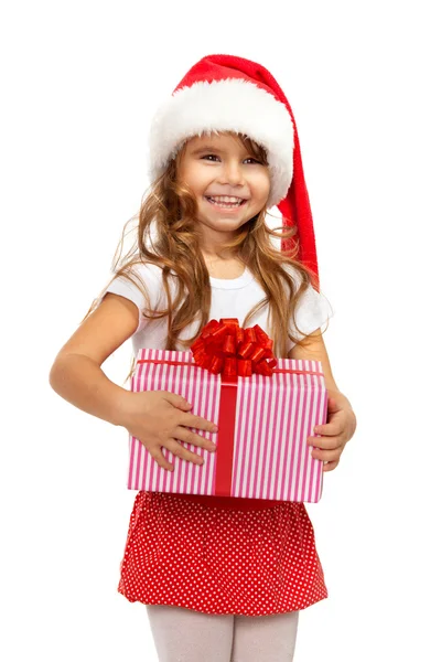 Child holding Christmas gift box in hand. Isolated on background — Stock Photo, Image