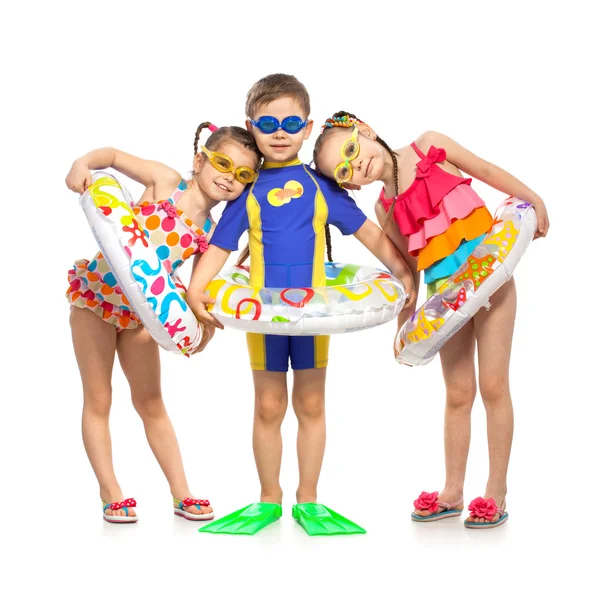 Niños felices en traje de baño y anillos inflables —  Fotos de Stock