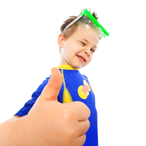Little boy with thumbs up gesture at sea — Stock Photo, Image