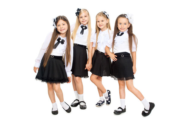Group of smiling schoolgirls, isolated on white background