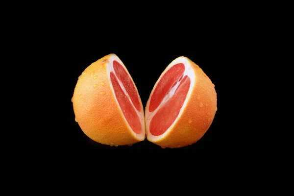 Grapefruit auf schwarz — Stockfoto