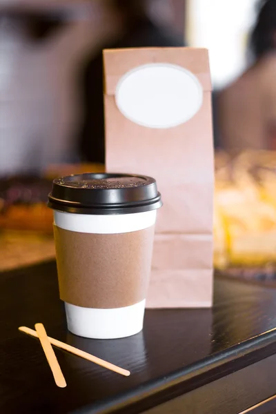 Disposable Paper Cup of Coffee or Tea, covered with black plasti — Stock Photo, Image