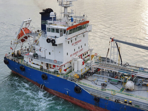Tanjung Pelepas, Malaysia - January 08: Fueler vessel in Tanjung Pelepas terminal on January 08, 2021 in Tanjung Pelepas, Malaysia.