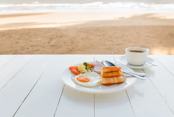 Breakfast set on white table. Stock Photo