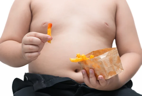 Batatas fritas na mão menino gordo isolado — Fotografia de Stock