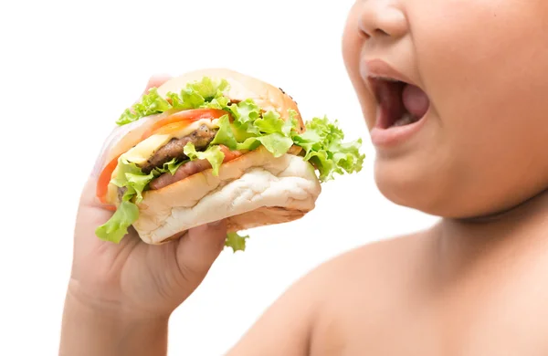 Obez şişman çocuk elinde hamburger