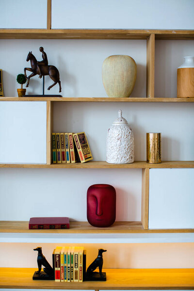 Items on the shelf in the cabinet