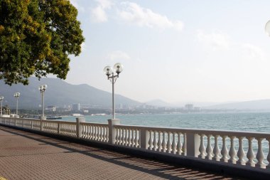 Embankment with lanterns along the sea