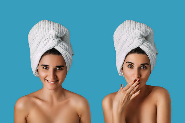Beautiful young woman with clean fresh skin touching her own face. Facial treatment, cosmetology, spa, make up concept. Young girl with a beautiful smile on her face, clean fresh skin. Portrait of a woman with a towel on her head
